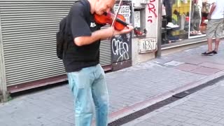 Russian violinist at Ciudad Vieja, Montevideo