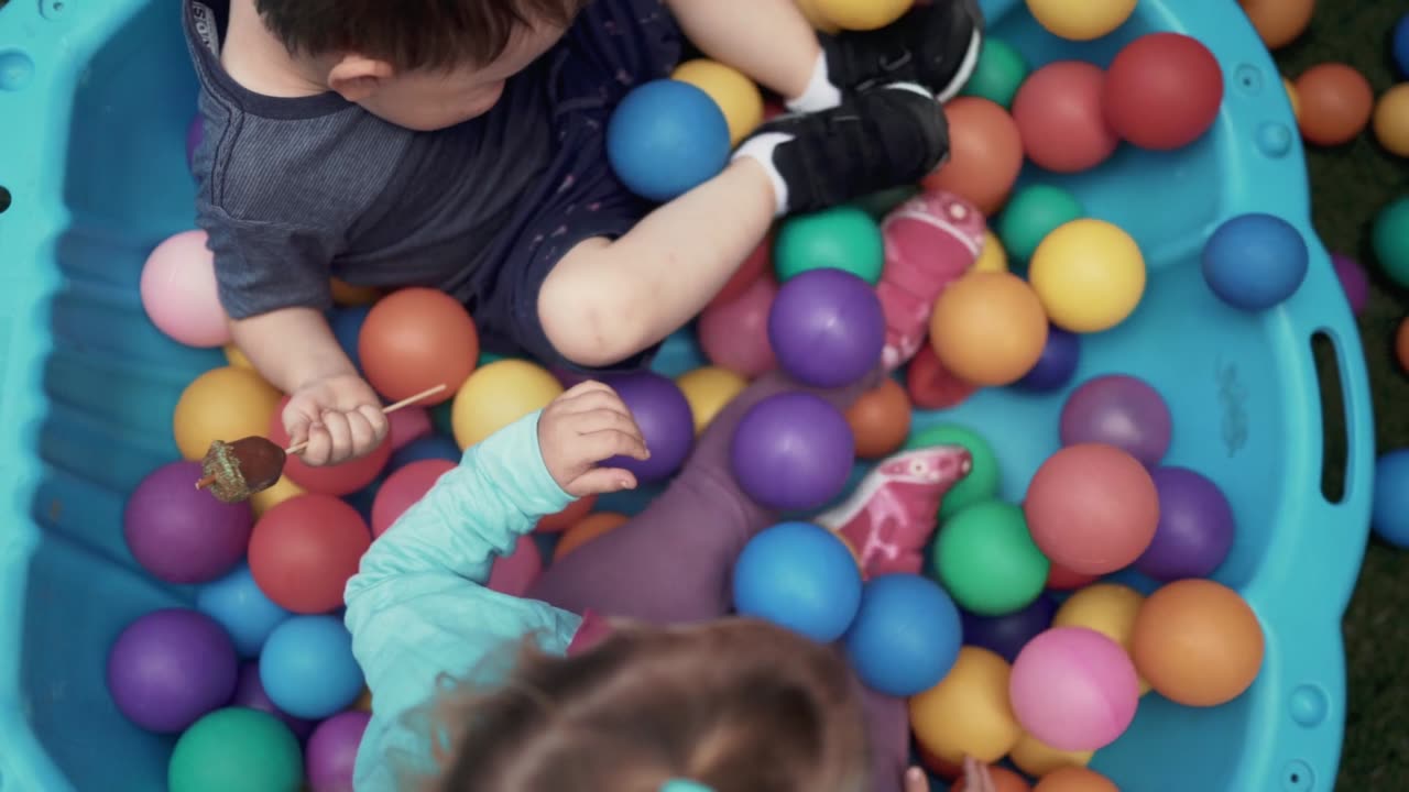 Baby Playing in Ball tub