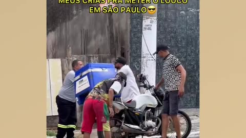 Chief Malokão and his pupils getting crazy on the streets of the outskirts of the city of São Paulo