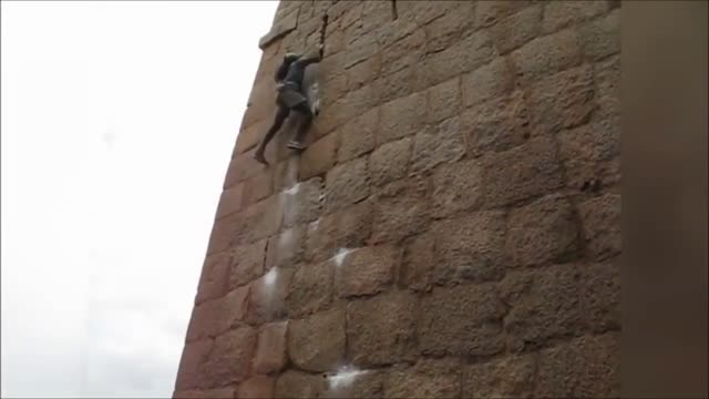 A Guy Who Can Climb The Wall With Bare Hands