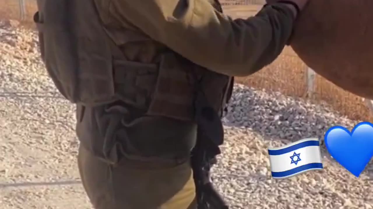 Two female IDF soldiers rescue a camel after finding it with its knee tied to its