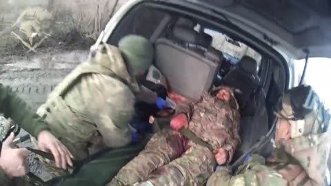 Ukrainian Medics Evacuate Wounded Soldier