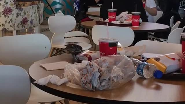 Bird ordering food inside a mall