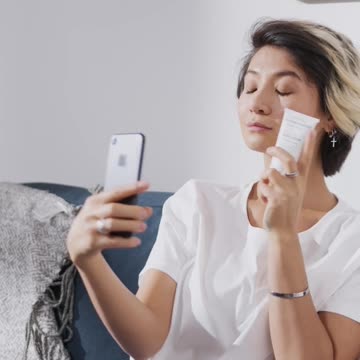 Girl with dog taking selfies (2021)