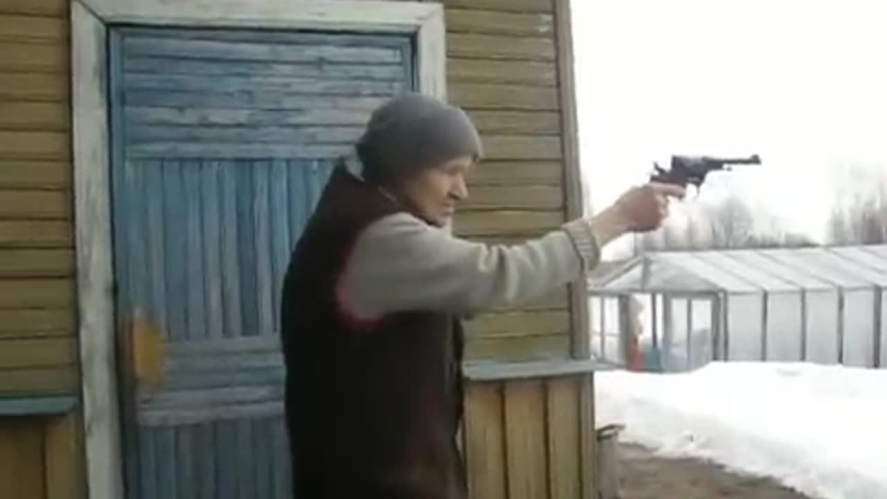 Russian grandmother shoots with a revolver