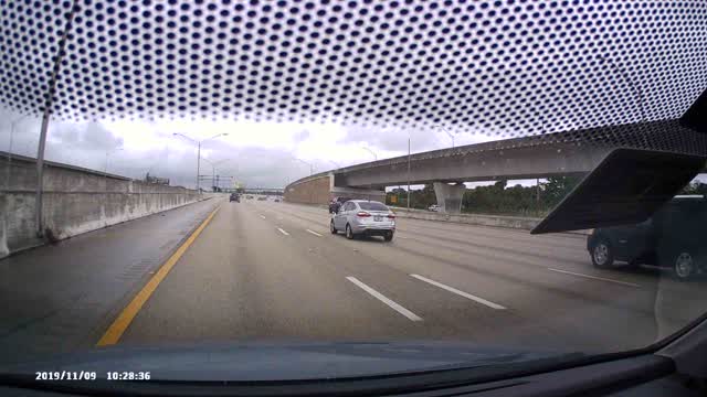 Car Hydroplanes Across All Lanes of Freeway in South Florida