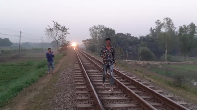 Funny boy fun with train. Don’t try this