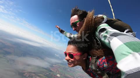 Beautiful Brazilian afro woman practicing skydiving