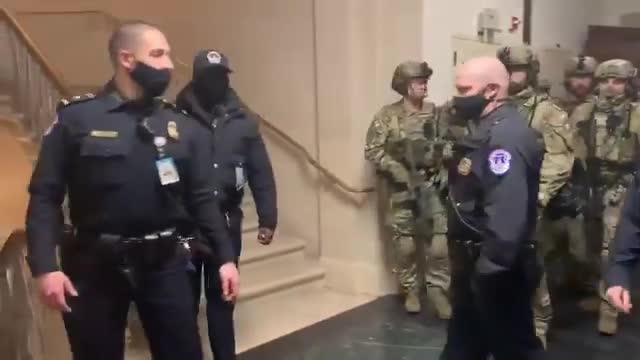 The National Guards walk through the White House