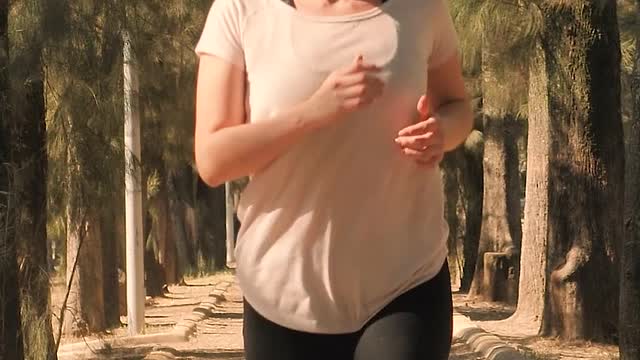 Woman wearing a mask while running