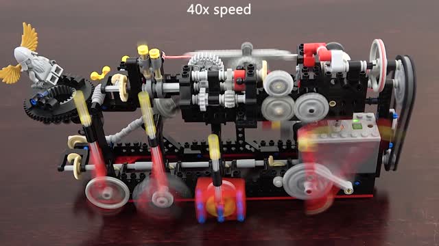 20 Mechanical Principles combined in a Useless Lego Machine
