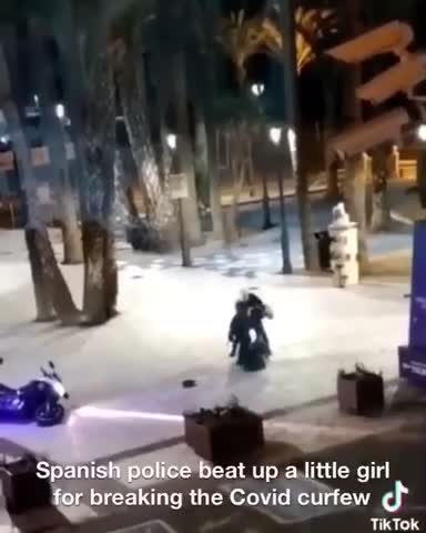Spanish Police Appear to Beat a Young Girl For Breaking COVID Curfew