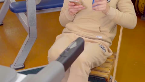 This Man Doing Treadmill Exercise While Sitting On A Chair