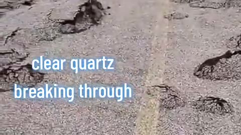 clear quartz breaking through road