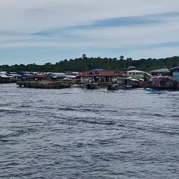 As you approach the port in Isabela, Basilan, the horizon is dotted with the homes of the Badjao!