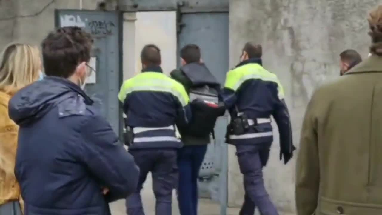 Italy, police state. Trieste, the city councilor arrives at work without a health passport and mask. He is asked to leave but refuses. Gets arrested by police