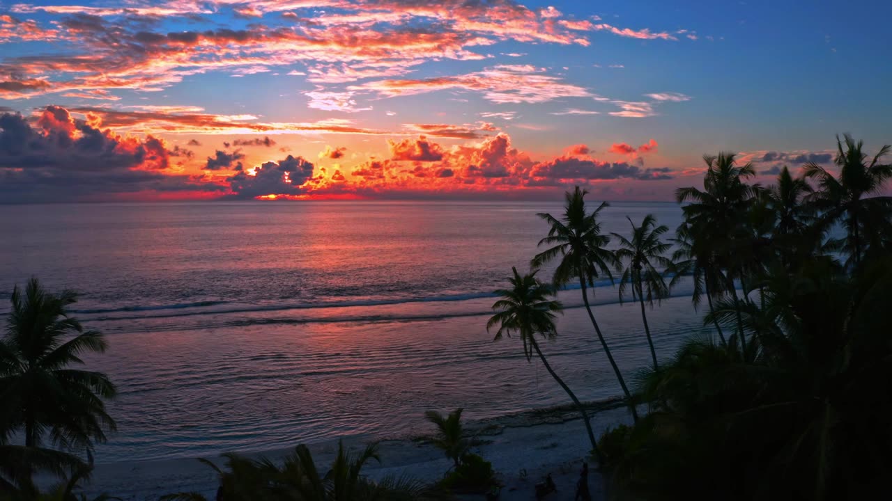 Bright orange sunset on beach