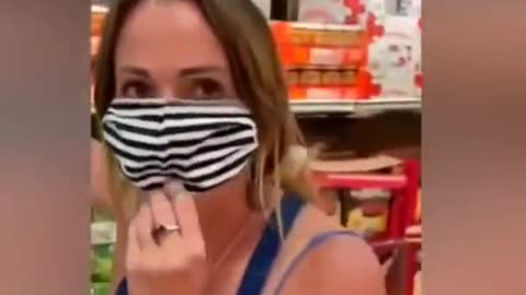 Shopper intentionally coughs on videographer