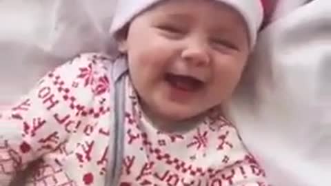 sweet baby is laughing