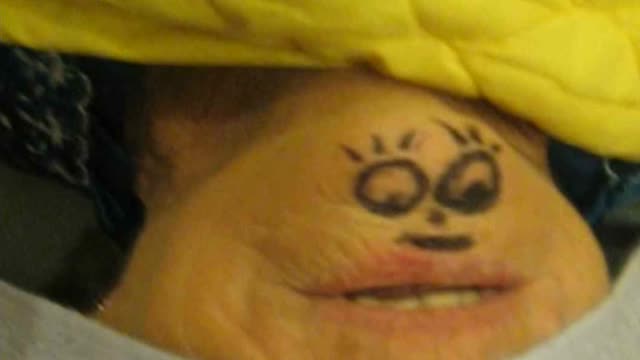 Old Woman Draws Face On Chin, Loses Dentures While Singing