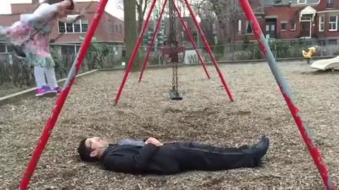 Awesome dad perfects swing stunt at the park