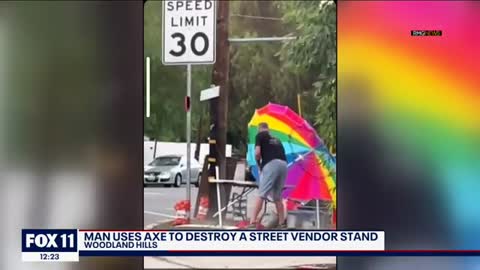 VIDEO: Man uses axe to destroy street vendor stand in Woodland Hills