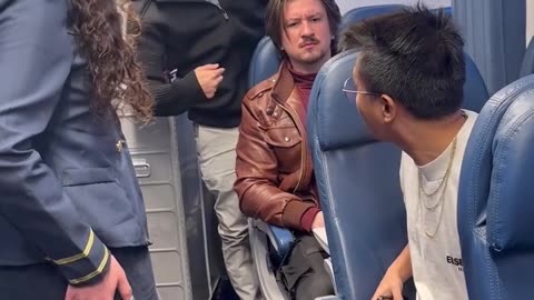 Guy got caught on the airplane filming the flight attendant.hd