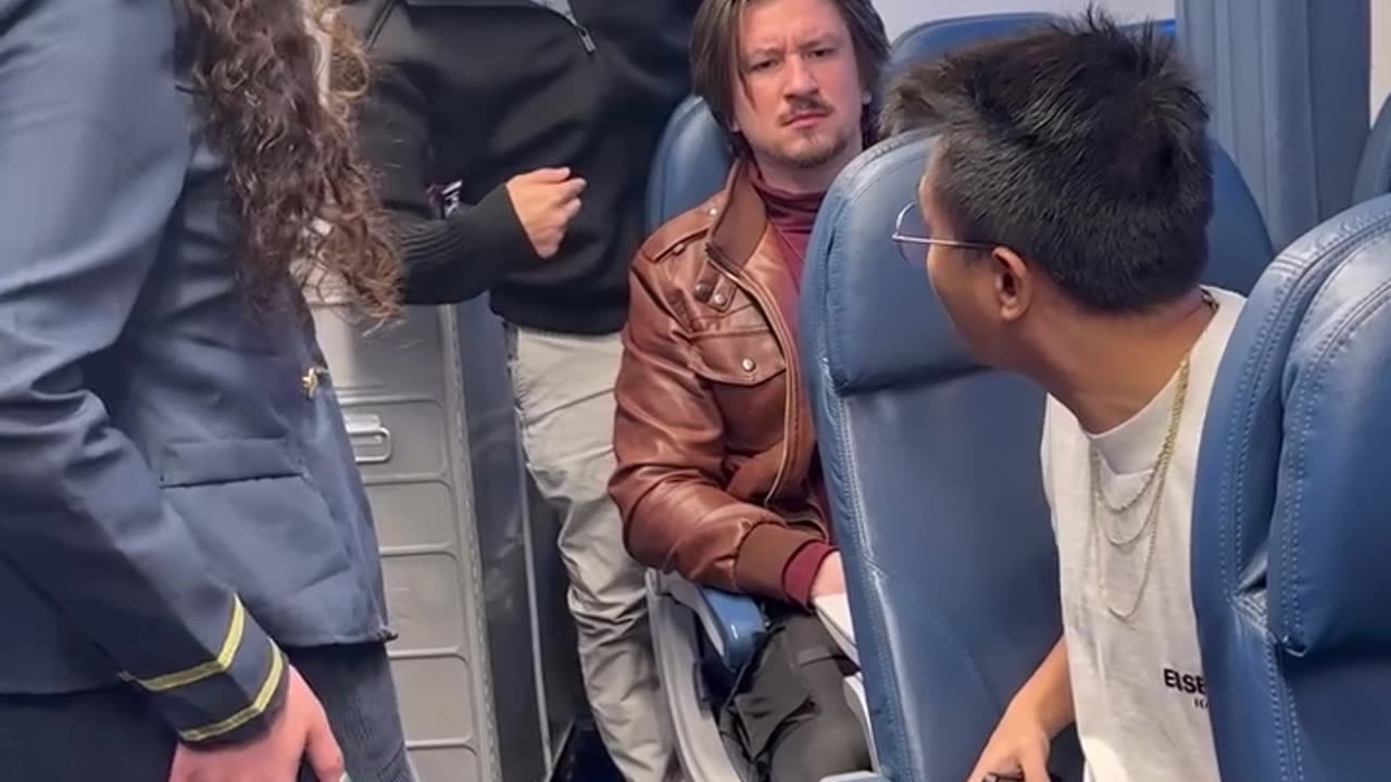 Guy got caught on the airplane filming the flight attendant.hd