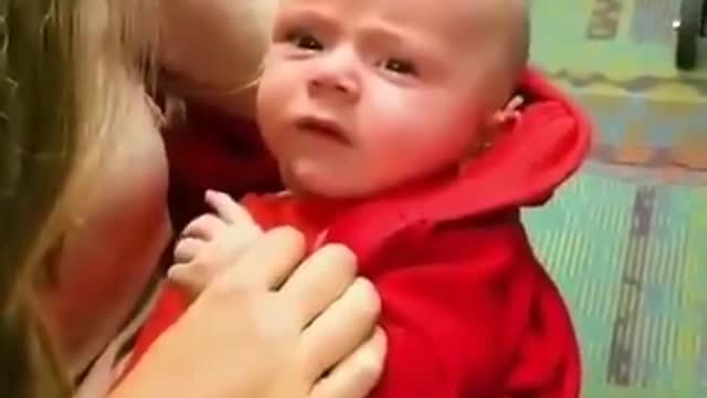 This child must hear the surroundings for the first time and really shake inside