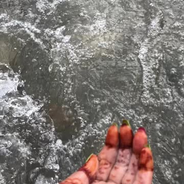 Cute girl having fun in the river