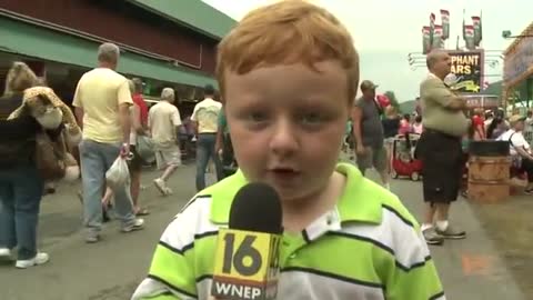 How awesome this kid steals the show from a reporter