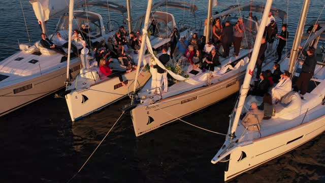 Wedding on a flotilla of Sailboats