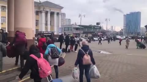 People rush to find shelter after air raid sirens go off in Kyiv