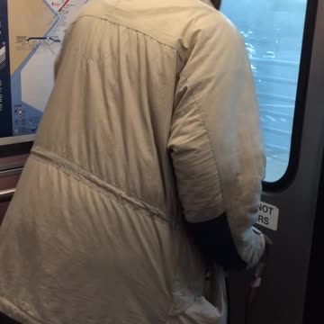 Red beanie cane guy dances and beatboxes on subway