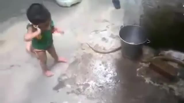 2 year baby playing with SNAKE