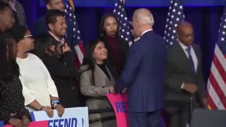 Biden Grabs Girl's Cheeks on Campaign Trail