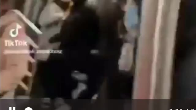 Black man beating up an Asian guy