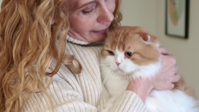 A Woman Cuddling Her Cat trening funny videos