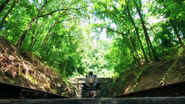 Low-Angle Footage Of A Locomotive Going