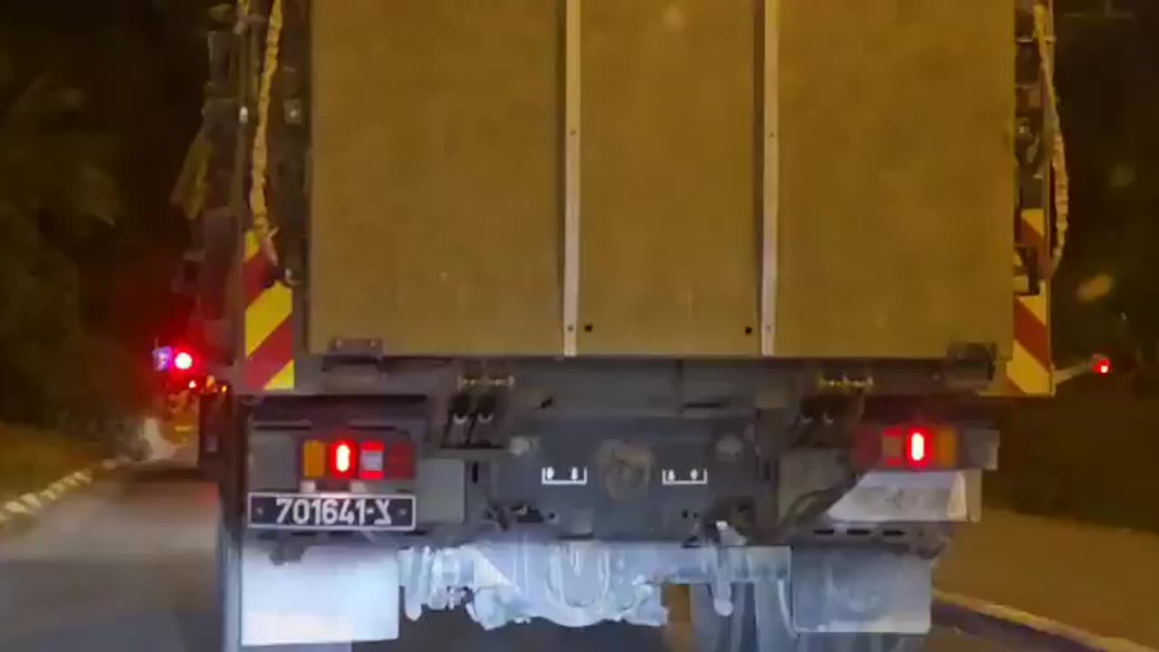 Trucks carrying Israeli soldiers are moving toward the border with Lebanon