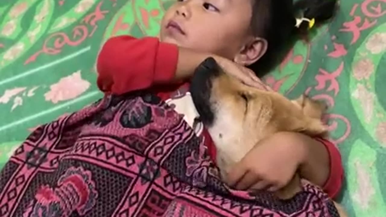 Little Girl Cuddles With Dog