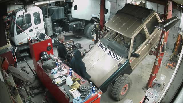 Jeep Falls off Lift in Shop