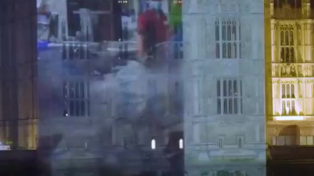 Government Corruption video Projected on A Building