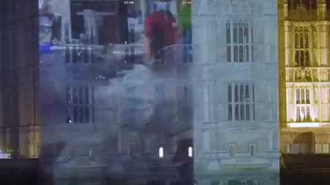 Government Corruption video Projected on A Building