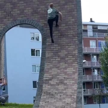 The guy runs along the wall