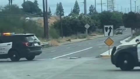 Man leads a high-speed chase in a golf cart