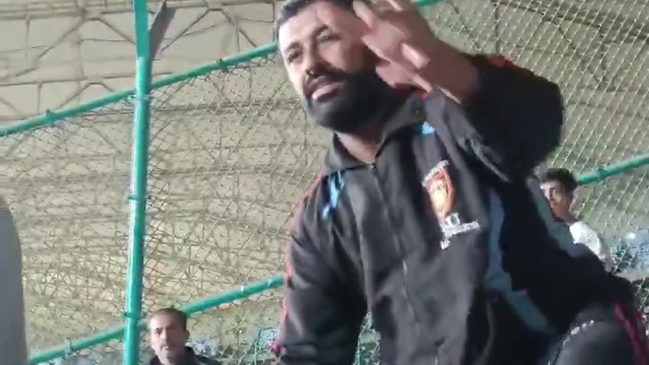 Security snatching Palestinian flag from public in PSL 9 match 2024.