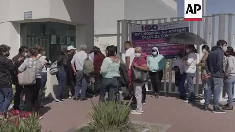 Relatives of brawl victims in Mexico anxiously wait outside hospital