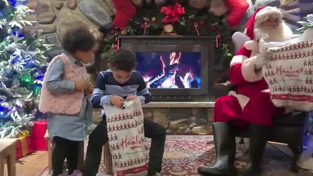 Little Girl Surprises Brother with Question About Santa's Gift