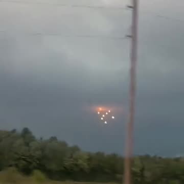 Date ,7,31,23. UK .A fleet of luminous UFOs traveling along the highway… 😲😳